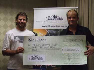 Quinton receving the 3 Cities Cheque